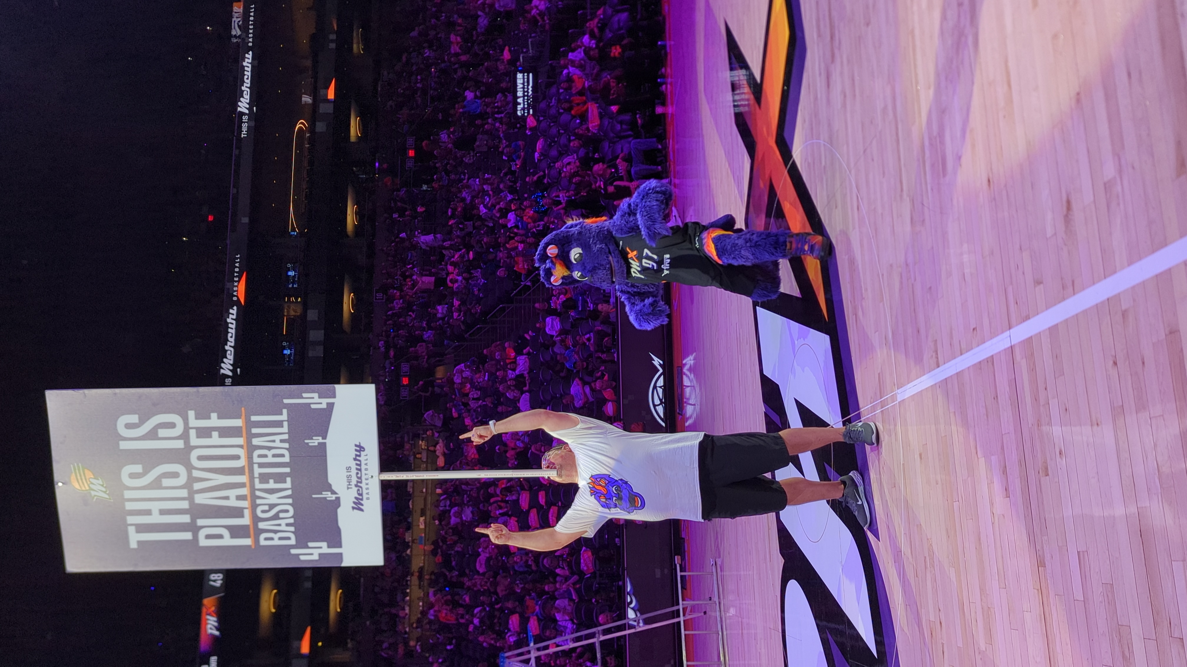 The Amazing Chin Balancer performing at playoff basketball game halftime